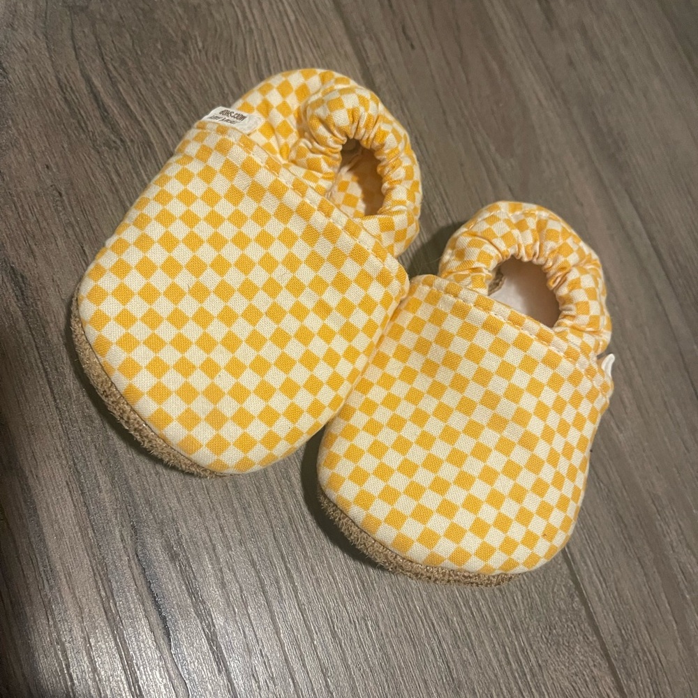 Yellow and white checkered moccasins